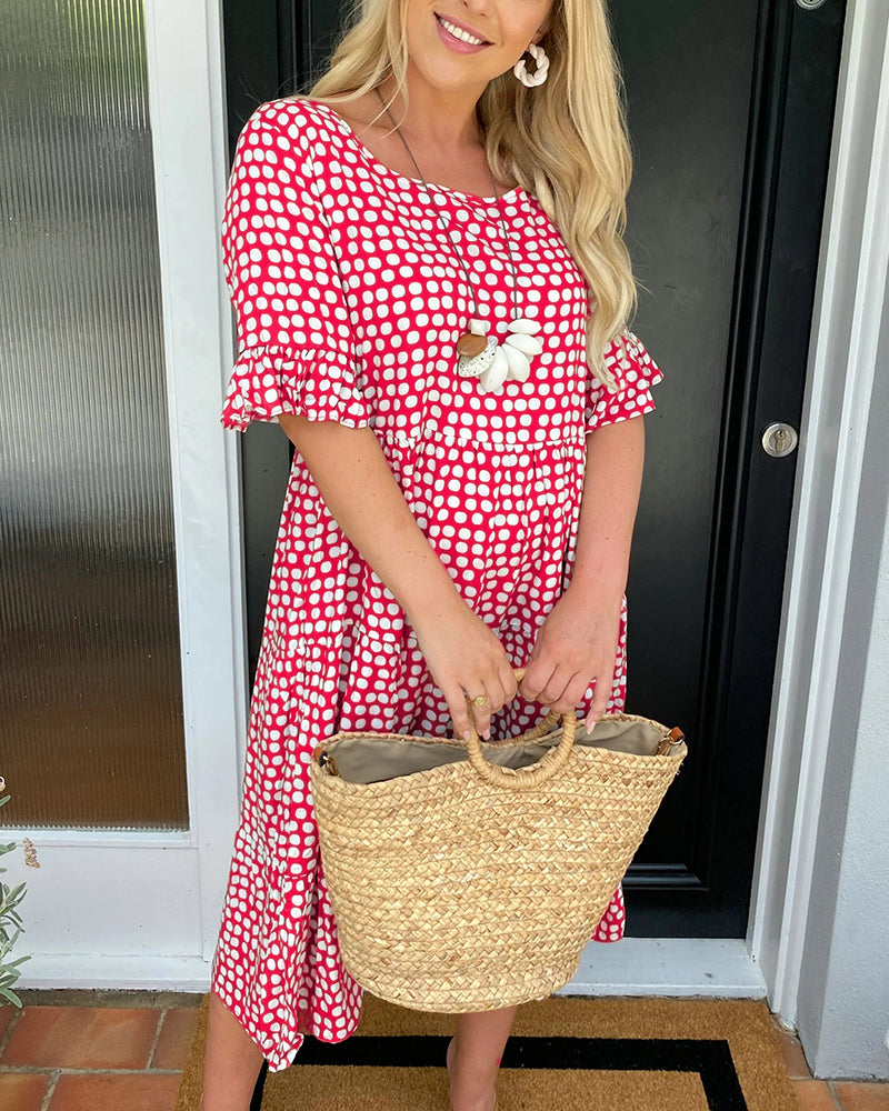 Seyfried - Midi dress with a round neckline and a polka dot pattern
