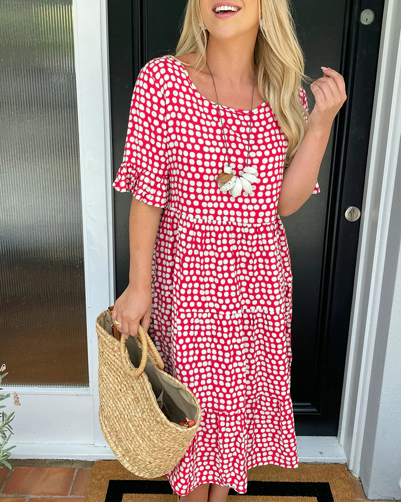Seyfried - Midi dress with a round neckline and a polka dot pattern